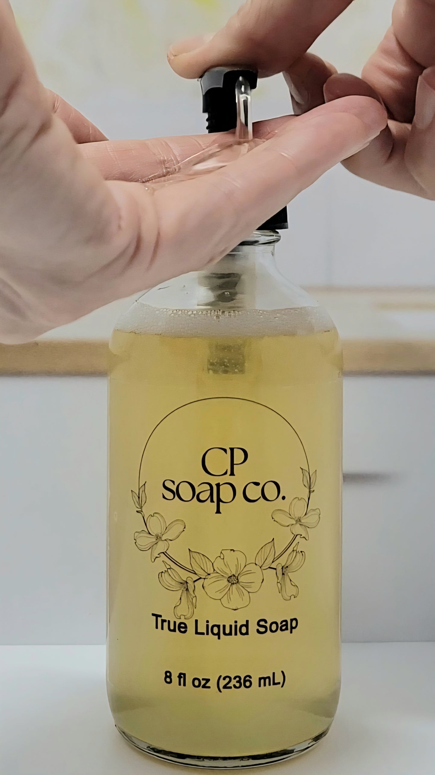 True liquid soap 8oz glass pump bottle being used