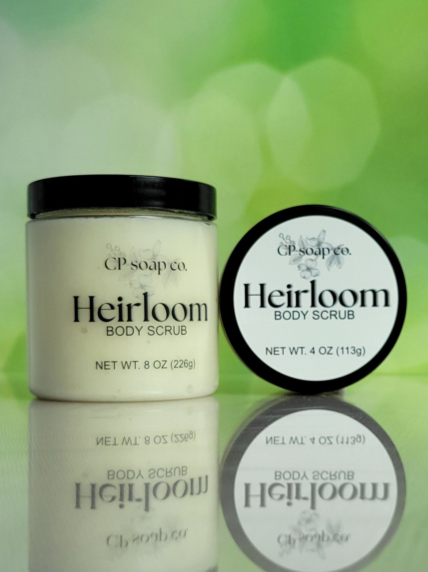 CP Soap Co. Heirloom Body Scrub with packaging on a green background