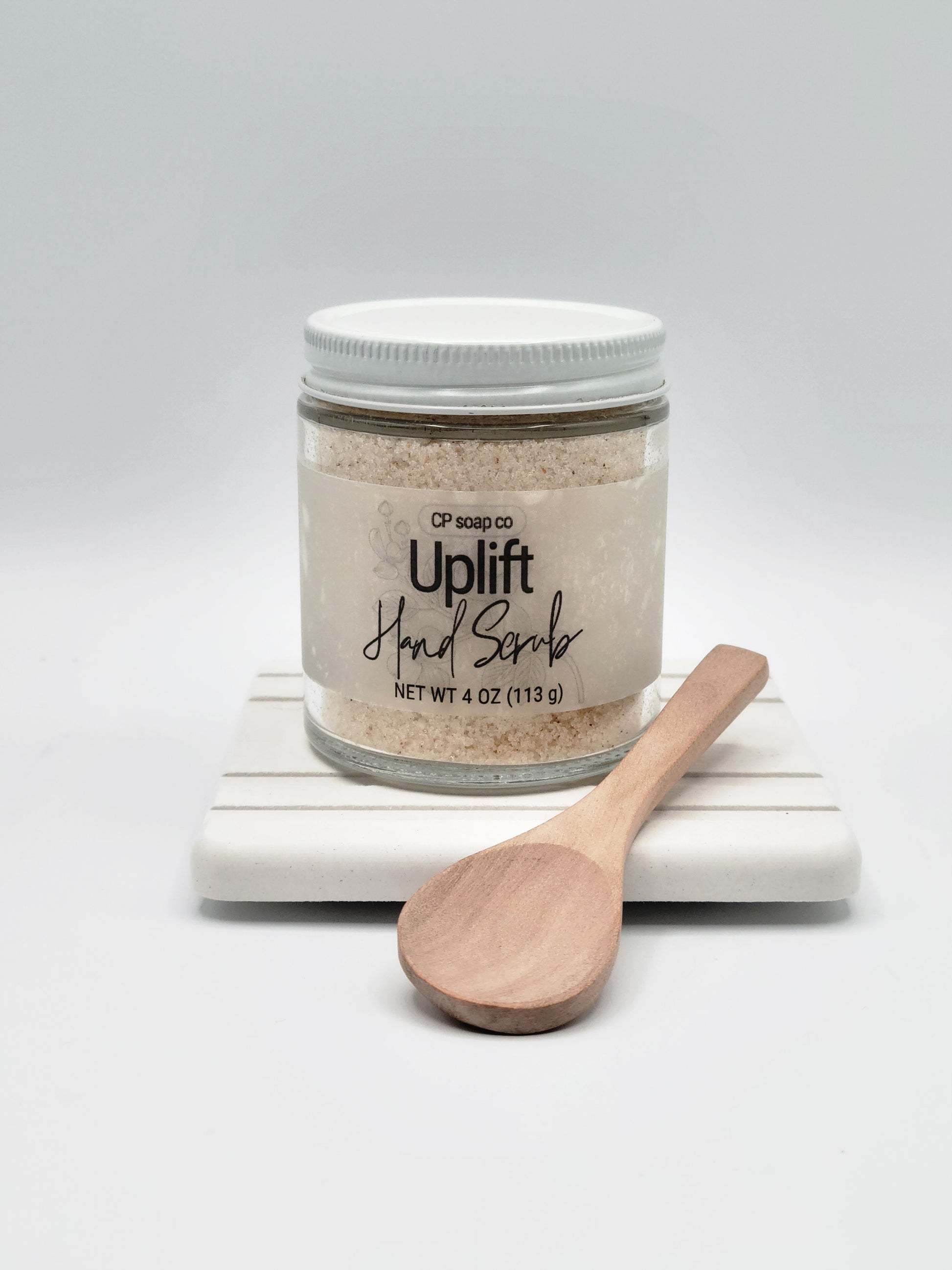 Handcrafted Uplift Hand Scrub citrus, spice, and woody